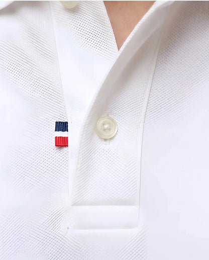 Polo Signature Ballon Ovale blanc, gros plan maille piquée